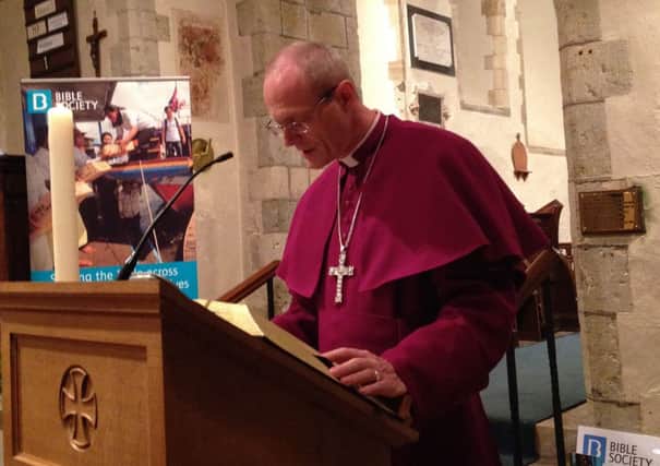 Bishop Mark reading a part of the New Testament