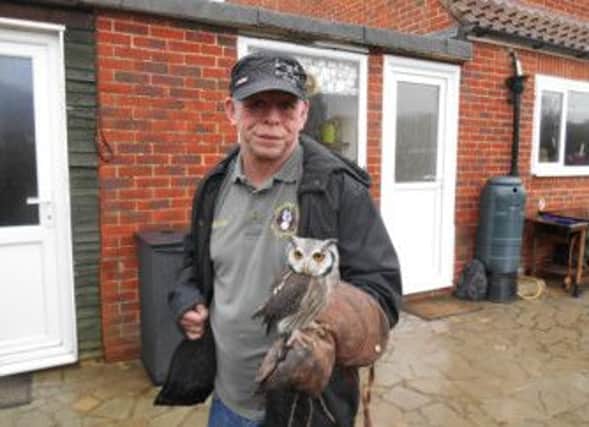 Gavin Woods, who has a learning disability, secured a placement as a part-time owl handler. cont