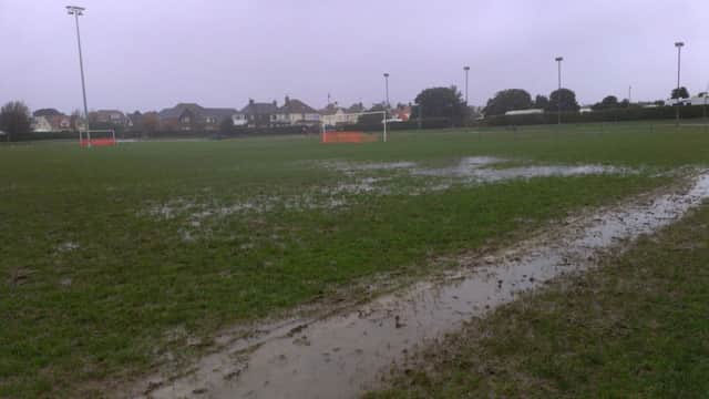 Bexhill United will be hoping their pitch dries out in time for the Boxing Day derby at home to Little Common. Picture by Simon Newstead