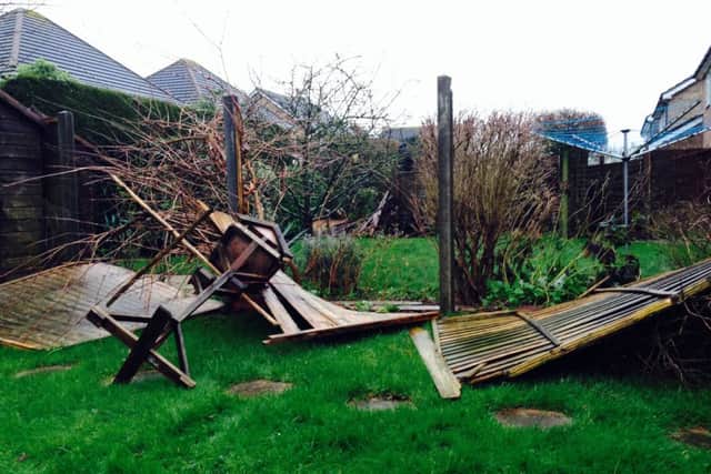 Fence panels blown down in Climping
