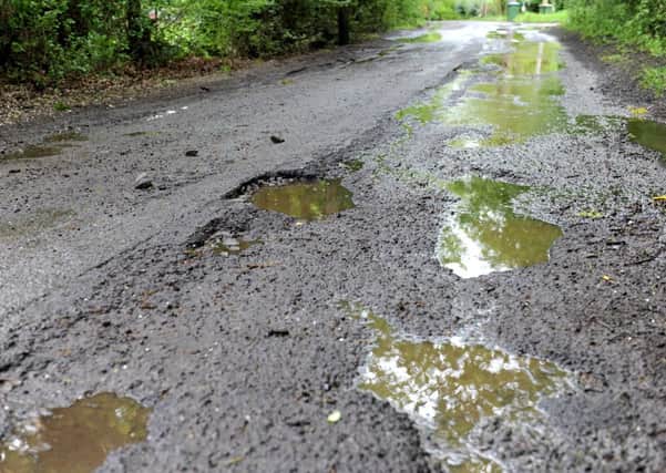 Potholes in West Sussex (photo by Derek Martin).