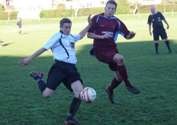 Bexhill United and Little Common go head-to-head in the Boxing Day derby at The Polegrove. Picture by Simon Newstead