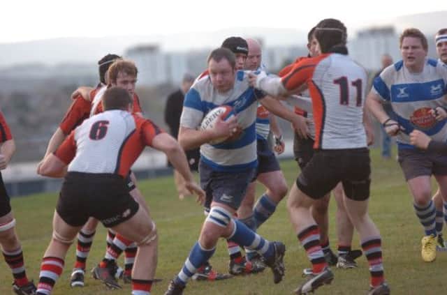 Jimmy Adams on the charge for Hastings & Bexhill during their last home league game against HSBC