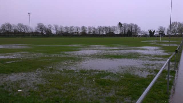 Rye United's game at home to Newhaven has unsurprisingly succumbed to a waterlogged pitch. Picture by Simon Newstead