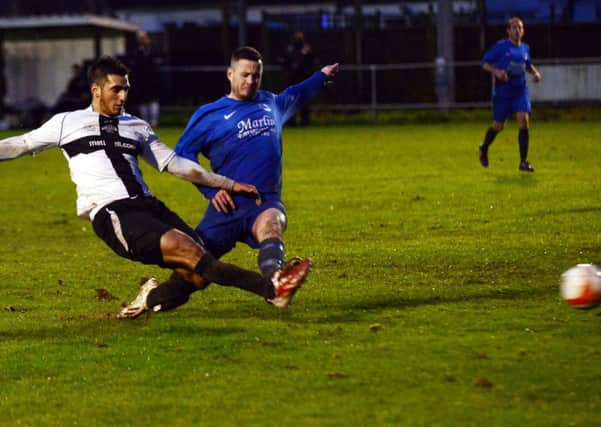 Shaheen Sadough scores East Preston's fourth goal against Selsey
