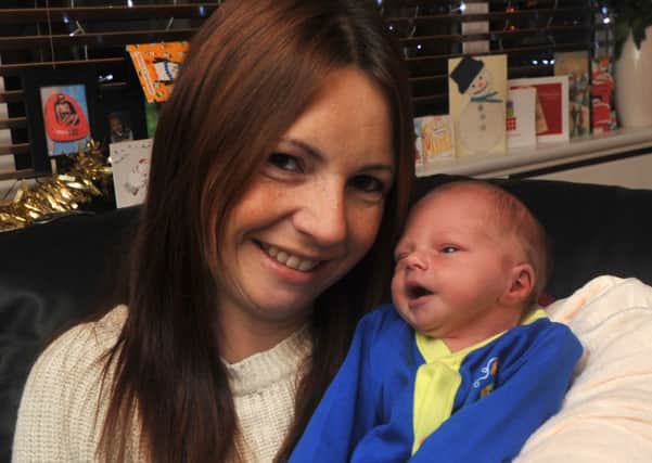 Natasha Mills with her baby son Oscar