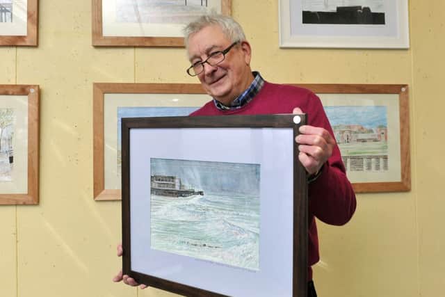 W01157H14 Terry Smith exhibits his artwork in Worthing Library
