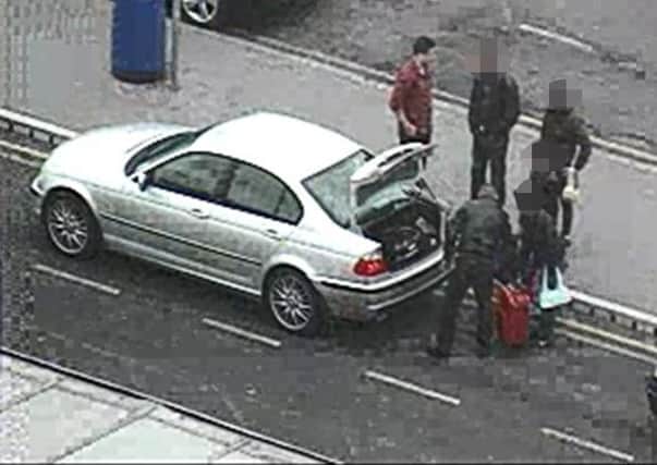 This incident took place at Luton Airport on 29 February 2012 and involved girls who had just arrived from Hungary being picked up. Mate Puskas can be seen in the maroon shirt and Zoltan Mohasci with the black coat with yellow emblem. There is another suspect in a black coat and white trainers.