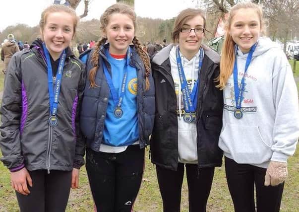 Hastings Athletic Club youngsters Kiera Aslett, Jazmin Clark, Ellen Brooker and Becky Smart with their medals