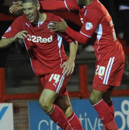 Crawley Town's Jamie Proctor celebrates his goal against Bristol Rovers in the FA Cup (Pic by Jon Rigby )