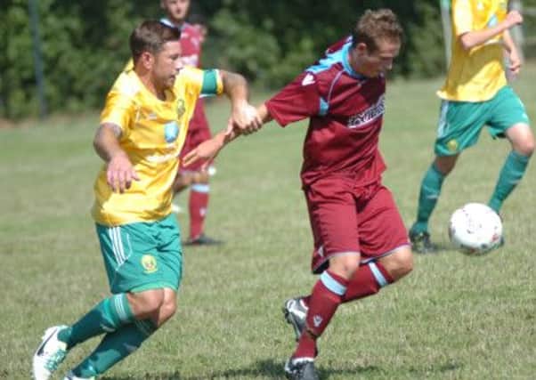 Jethro Warren (left) in action for Westfield against Little Common earlier this season. Picture by Simon Newstead