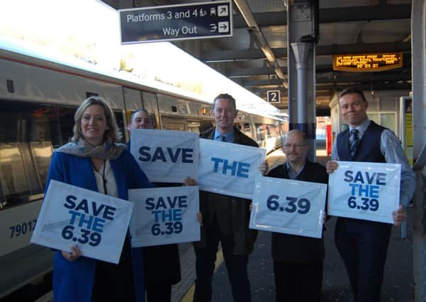Amber is pictured with Greg Barker (MP for Battle and Bexhill), Ray Chapman (Chairman of ESRA) and other rail activists and commuters