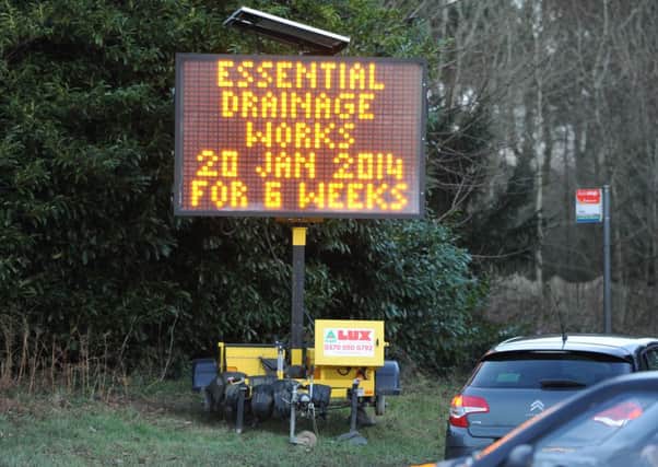 JPCT 140114 Sign warning of road works, just east of Storrington. Photo by Derek  Martin