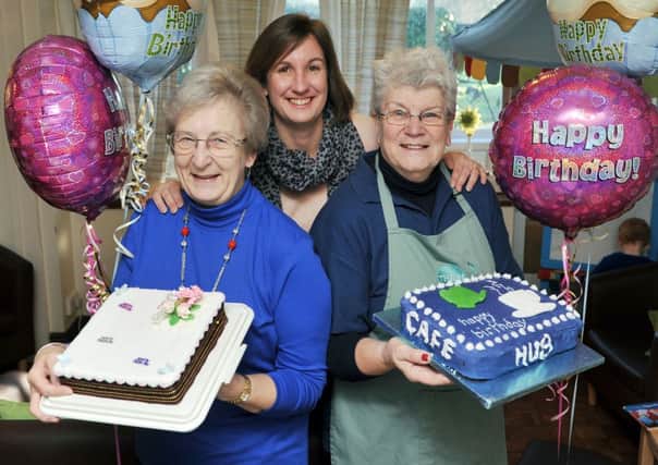 S02265H14-HubCafe

The Hub Cafe in Upper Beeding which is celebrating it's first birthday. Pictured is L-R Sue Harris (volunteer and cake maker), Vicki Butchers (Cafe Coordinator) and Daphnie Williams (volunteer and cake maker).