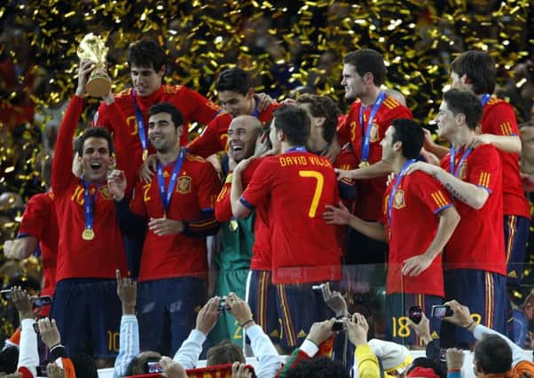 Current World Cup holders Spain celebrate their victory over the Netherlands in 2010