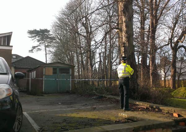 Sussex Police guard a cordon or land at Three Bridges Free Church, Haslett Avenue East