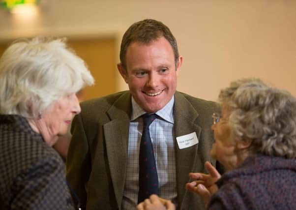 Nick Herbert MP talking to Jean Seagrim MBE and chairman Gwen Parr of the Pulborough and District Community Care Association.  Photo credit Dave Boys LRPS  www.whywhatwhere.com