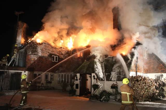 Firefighters battle to contain a blaze at a home in East Preston    PHOTO: Eddie Mitchell