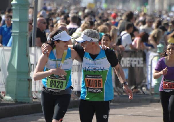 Zoe Norman, left, running the Brighton Marathon
