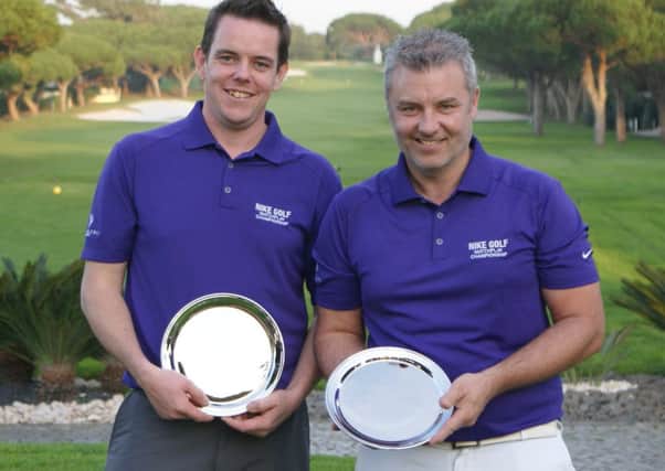 Beauport Park Golf Club pair Gary Begbie and Robert Wheeler with their prizes for winning the 2014 Nike Matchplay Tournament in Portugal