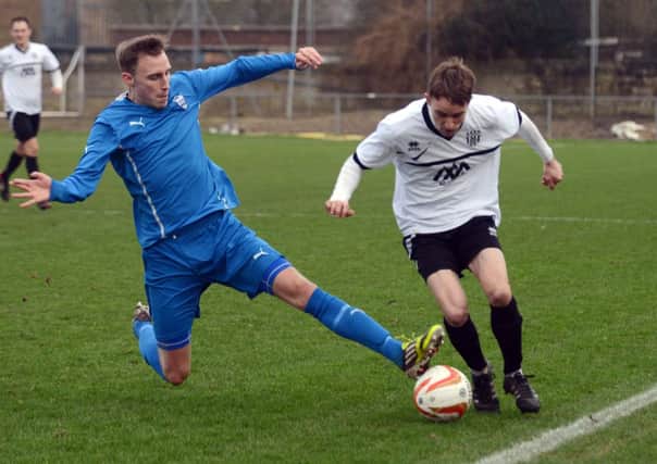 Action from East Preston's win over Brantham
