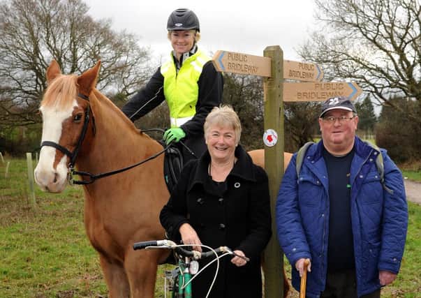 Councillor Pru Moore, MSDC Cabinet Member for Leisure and Sustainability (centre) with local resident Becky Davis, her horse Major Tom and keen rambler Les Campbell