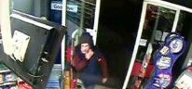 CCTV image of the suspect, in Tesco, Rectory Road, Worthing