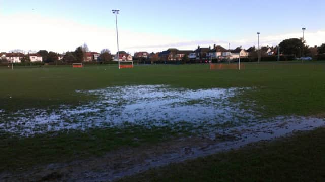 There was plenty of standing water at The Polegrove, home of Bexhill United FC, this morning. Picture by Simon Newstead