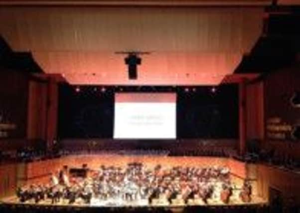 Oathall students playing with the London Philharmonic Orchestra at the Royal Festival Hall