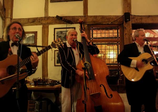 Burgess Hill District Lions presented an evening with Wilbury Jam at the Oak Barn Restaurant