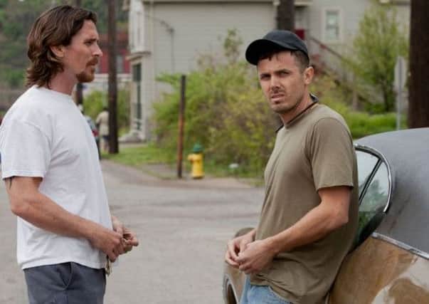 Christian Bale and Casey Affleck in Out of the Furnace