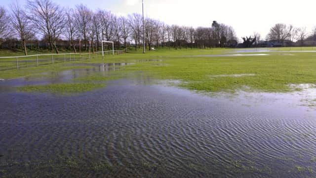Rye United's pitch has been under water lately following all the recent rain. Picture by Simon Newstead
