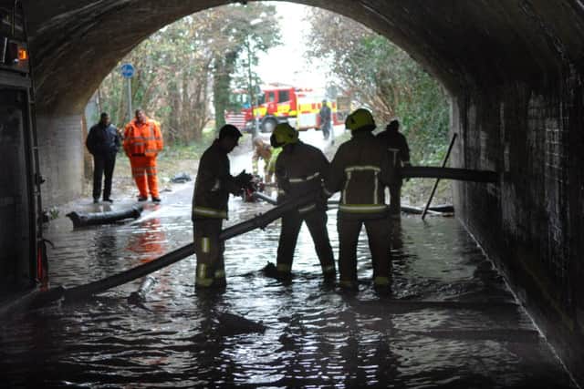jpco-12-2-14 Fire service pump out flooded Maidenbower school railway tunnel walk way (Pic by Jon Rigby)