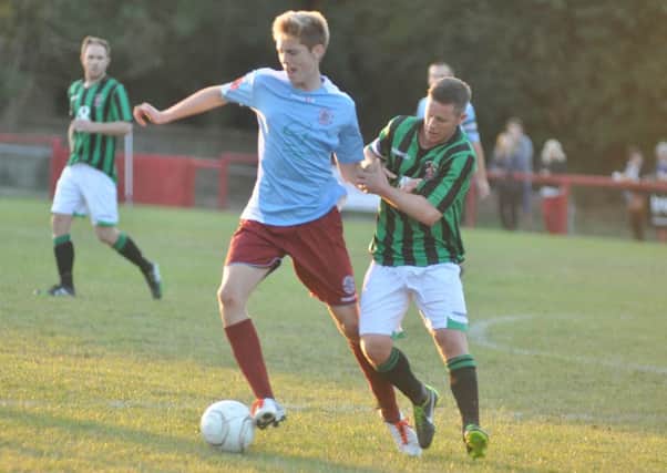 Tom O'Connor on the ball for Hastings United against Burgess Hill Town earlier in the season. Picture by Simon Newstead