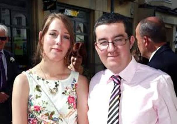 Terry Davies, right, who was murdered in Littlehampton, last year. He is pictured with his girlfriend Kerry Stark.