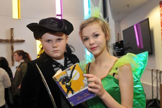 Carl Jones (14) and Shannon Gaskin (13), right, dress as Captain Hook and Tinkerbell from Peter Pan     L06060H14.