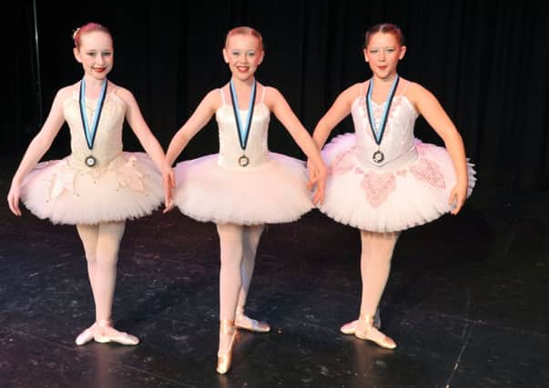 W06029H14 Kiera Bateman (3rd), Lucy Spiers (1st) and Darcie Wild (2nd) in the ballet solo 10 years category