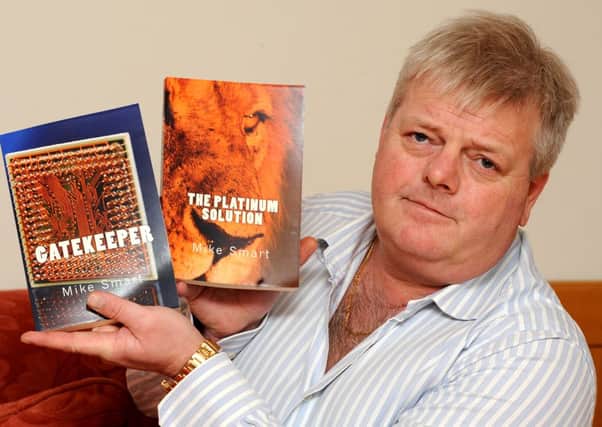 JPCT 010214 Mike Smart has written two books called 'The Platinum Solution' and 'Gatekeeper'. Photo by Derek Martin