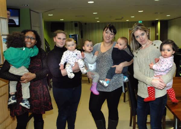 jpco-12-2-14 Mums preparing for bake sale for premature baby charity. L-R, Tammy and Dominic, Heidi and Genesis, Sue, Annabelle and Lucas, Suzy and Molly   (Pic by Jon Rigby)