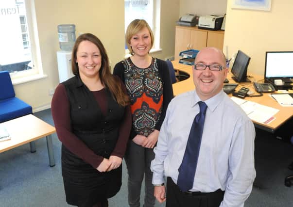 Senior recruitment consultant Brendon Cook, with team members, recruitment officer, Ashley Pinkham, left, and Kerry Sleeman, administrator.Picture by Kate Shemilt.C140188-2