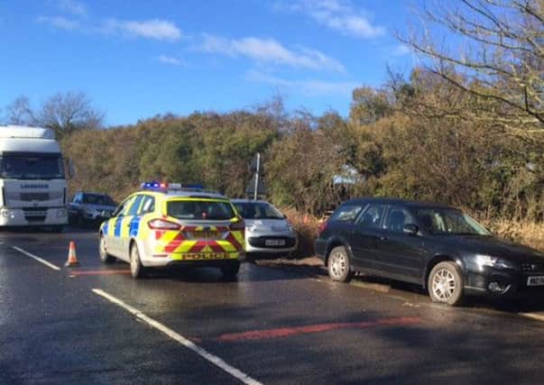 Police direct traffic on Station Road, Pulborough
