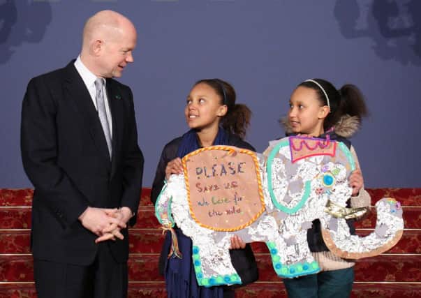 William Hague with pupils at Summit crop
