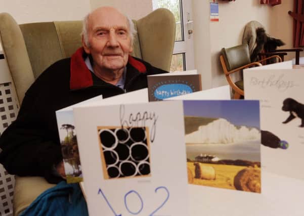 Len Burstow, pictured in the Herald on his 102nd birthday at Windsor Rest Home in Worthing W47731H12