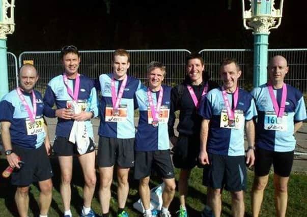 several of the Burgess Hill Runners with their medals.