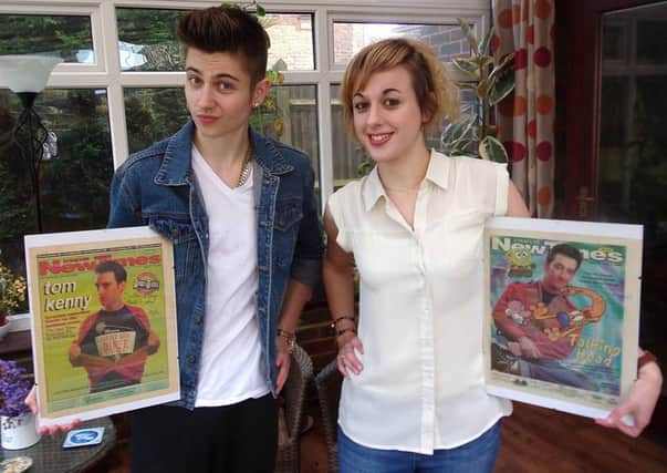 George and Charlotte Horlock with Tom Kenny's gift