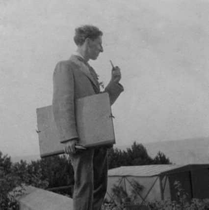 Oliver Gotch with pipe, pens and portfolio, on a sketching trip in France