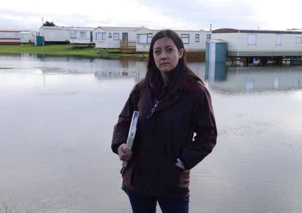Sarah Owen at flood scene