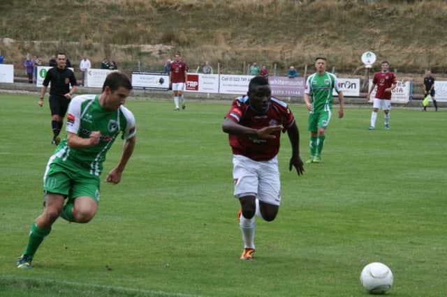 Action from the FA Cup tie between Hastings United and Guernsey in September. Picture by Terry S. Blackman