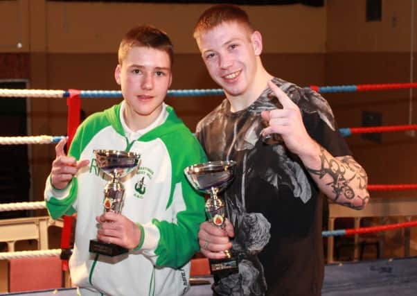 Junior boxer of the night Richard Harffey and senior boxer of the night Shaun Attrell with their trophies. Picture courtesy Luke Harmer, Pinpoint Sport