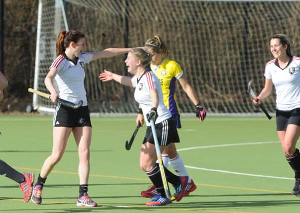 Emma Whipps can hardly hide her delight after scoring a wonderful goal from a short corner.Photos by Derek Martin